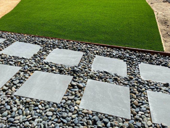 Artifical law with pavers & rock walk